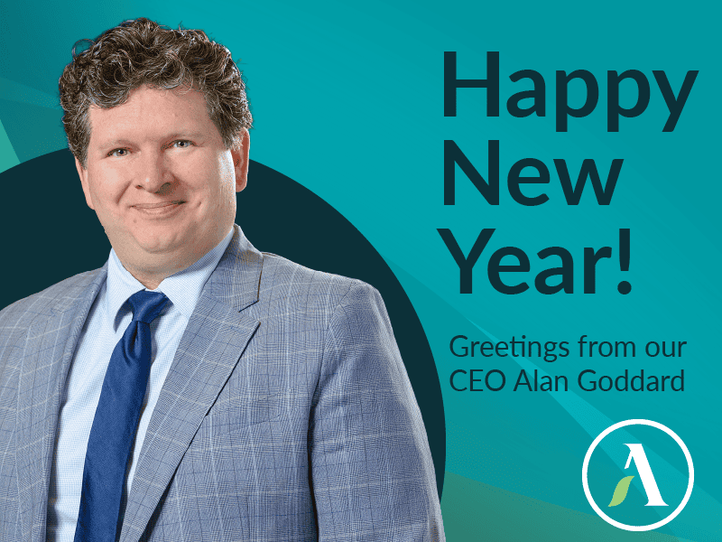 Abundance Canada CEO, Alan Goddard smiles beside a new year greeting.